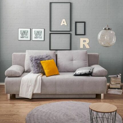 Kleines Wohnzimmer mit grauen Sofa modern eingerichtet